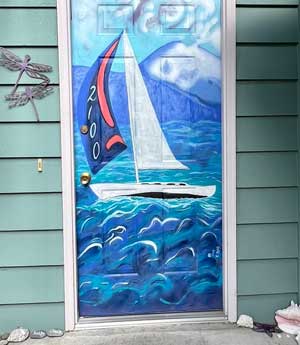 A sailboat painted on a front door