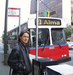 Kathy waiting for the bus "to Alma." Photo by Chuck Dingee