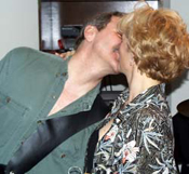 Joe and Carol, engagement kiss