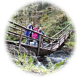 photo of Kathy, Chuck and Jim Tantum on bridge